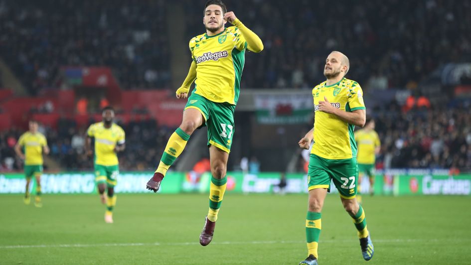 Norwich City's Emi Buendia (left) celebrates his goal at Swansea