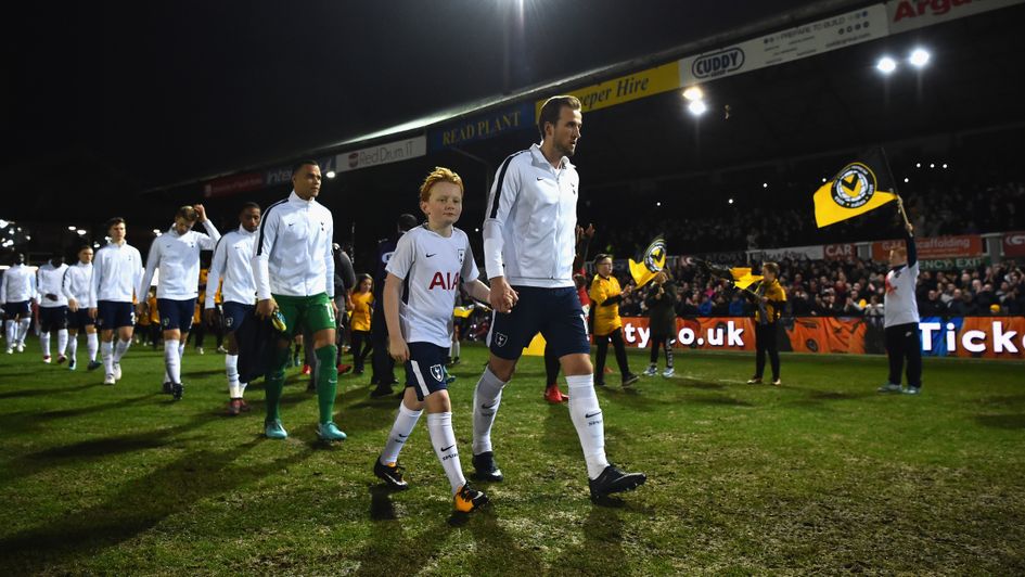 Harry Kane leads out Spurs at Newport
