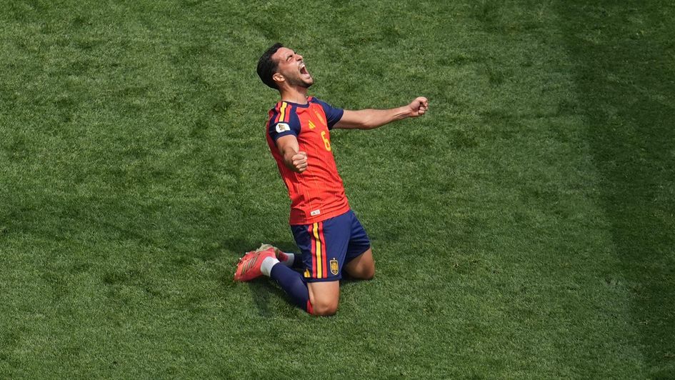 Mikel Merino celebrates for Spain against Belgium