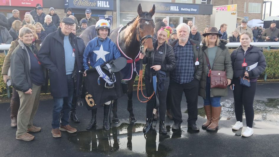 A delighted Benvoy team pose for the cameras