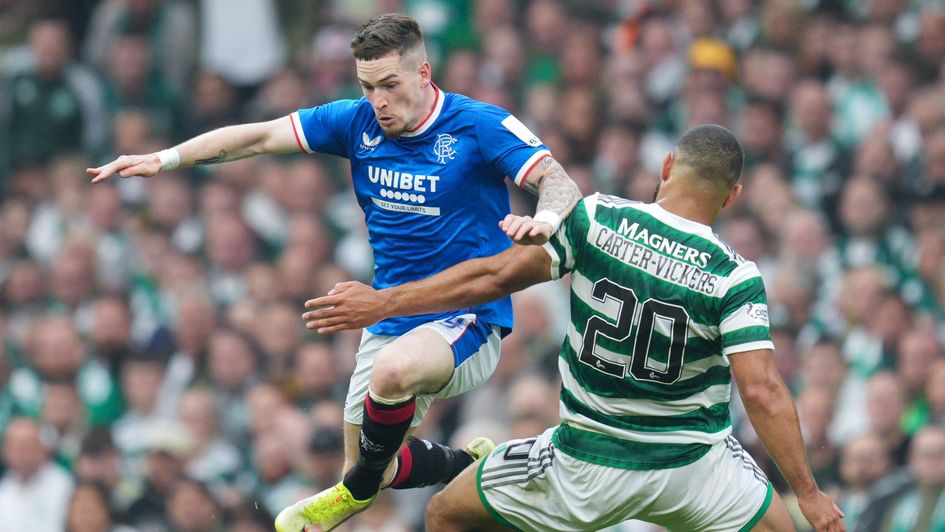 Ryan Kent of Rangers is fouled by Cameron Carter-Vickers of Celtic