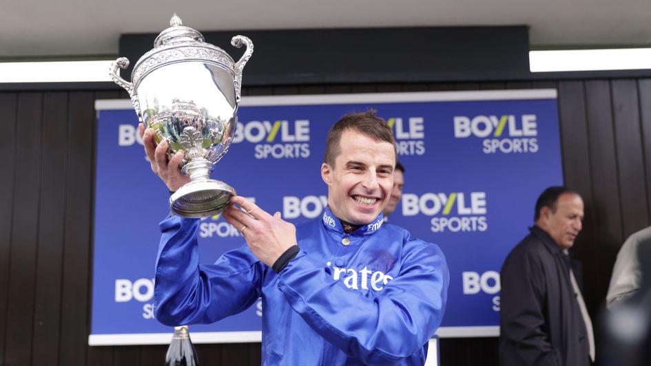 William Buick has his hands on the Lockinge trophy