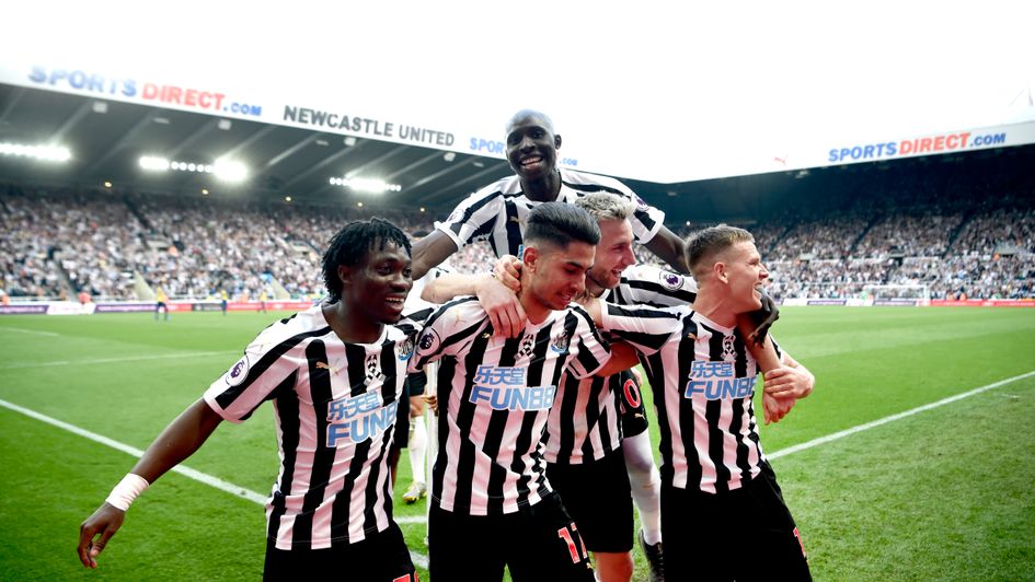 Newcastle players celebrate Ayoze Perez's hat-trick goal against Southampton