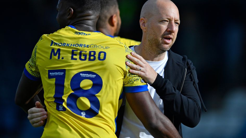 Colchester boss Ben Garner (right)