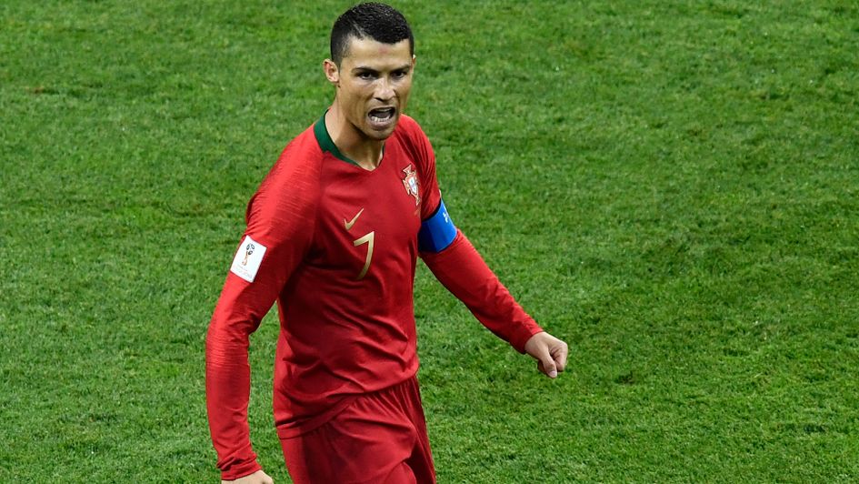 Cristiano Ronaldo celebrates his early penalty for Portugal v Spain
