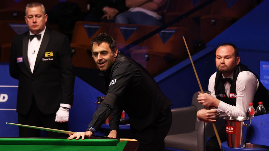 Ronnie O'Sullivan and Mark Joyce in action on day one of the World Championship