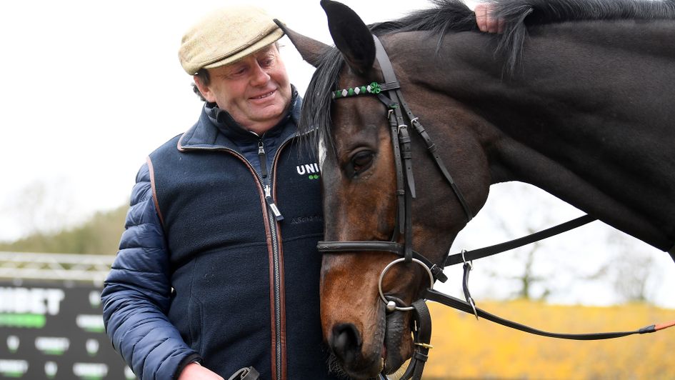 Trainer Nicky Henderson poses for a photo with Altior