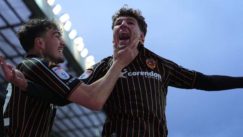 Lewis Koumas celebrates scoring the winning goal