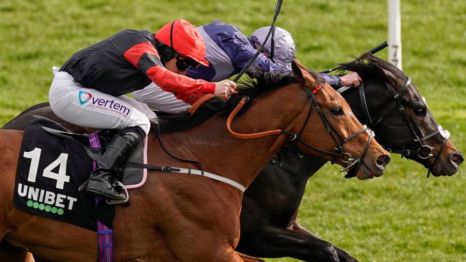 Artistic Rifles (red cap) rallies to win the Unibet Spring Mile