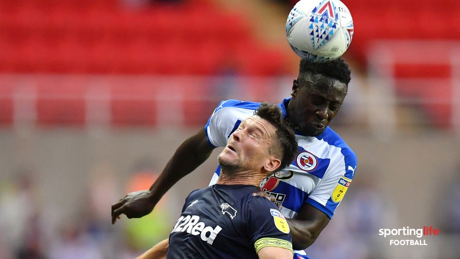 Andy Yiadom beats David Nugent to the ball