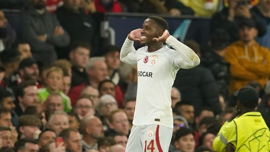 Wilfried Zaha celebrates scoring at OId Trafford