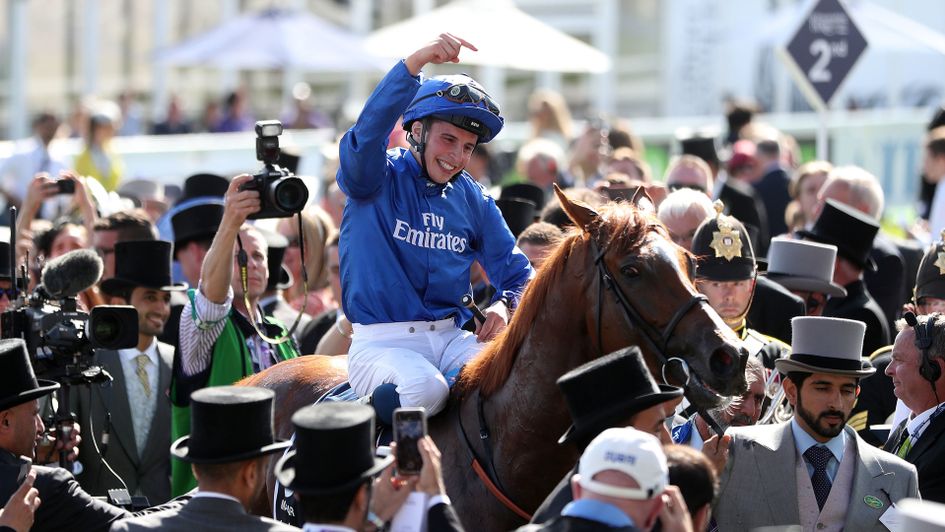 William Buick celebrates on Masar after the Derby