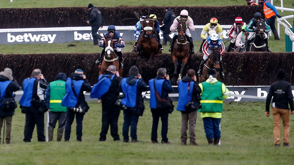 Photographers gets their shots of the Champion Chase field