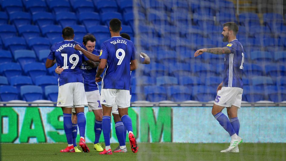Lee Tomlin: Cardiff forward celebrates his goal against Derby