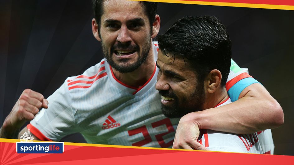 Diego Costa celebrates his goal against Iran with Isco