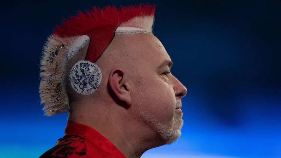Peter Wright came dressed as Santa Claus...