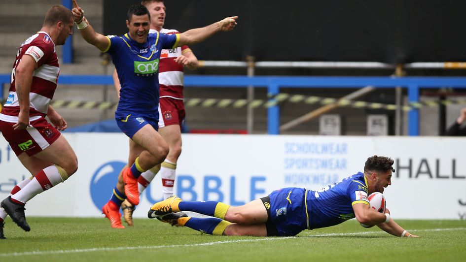 Warrington Wolves' Declan Patton scores his side's fourth try