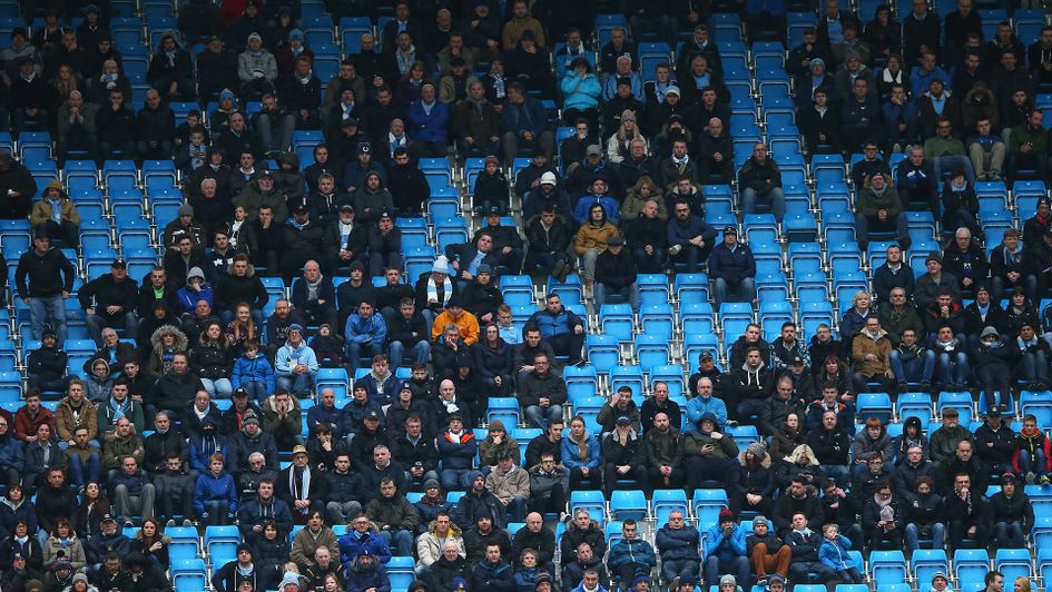 Manchester City fans at the Etihad Stadium