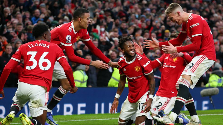 Fred and his Manchester United team-mates celebrate his goal