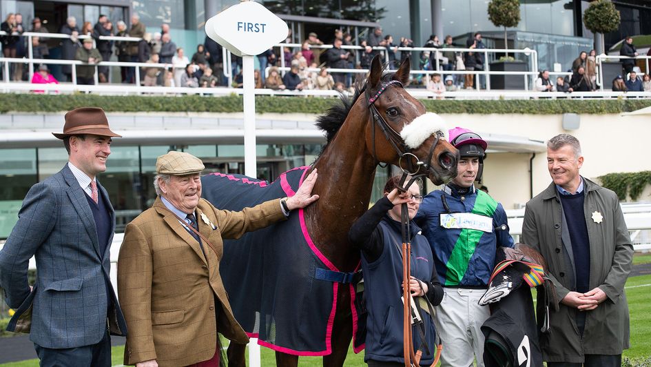 Trainer Toby Lawes (far left) stands with Ascot winner Gnomon