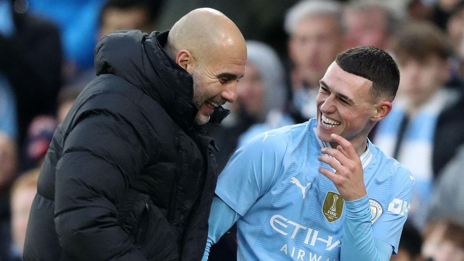 Pep Guardiola and Phil Foden