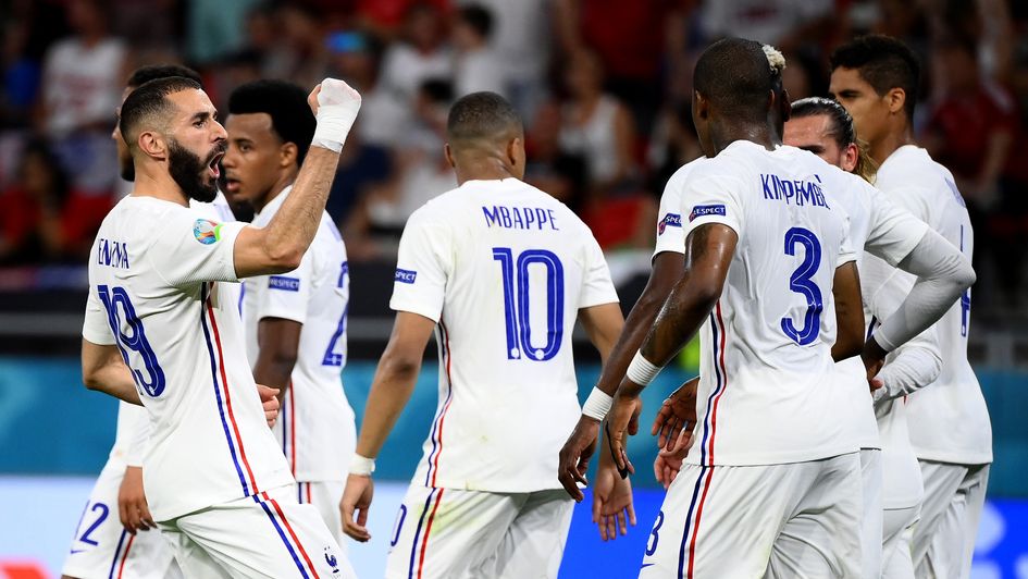 Karim Benzema celebrates for France