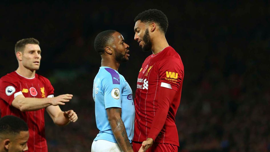 Raheem Sterling and Joe Gomez square up during Liverpool v Man City