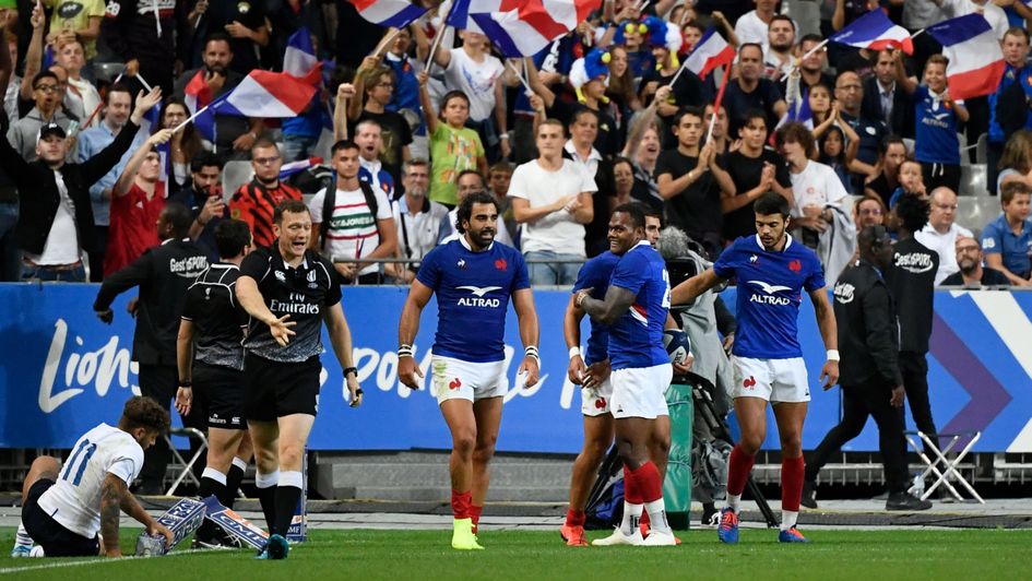 France players celebrate a try against Italy at the Stade de France