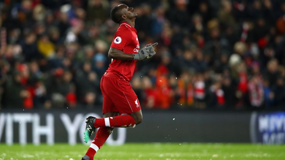 Sadio Mane: The Liverpool forward celebrates his goal against Leicester