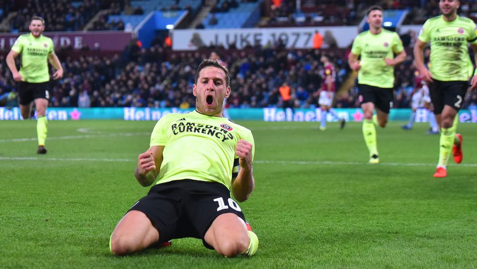 Billy Sharp celebrates his third goal against Aston Villa