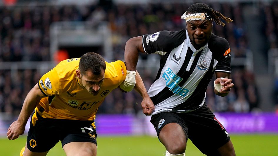 Allan Saint-Maximin (right) and Jonny Castro battle for the ball