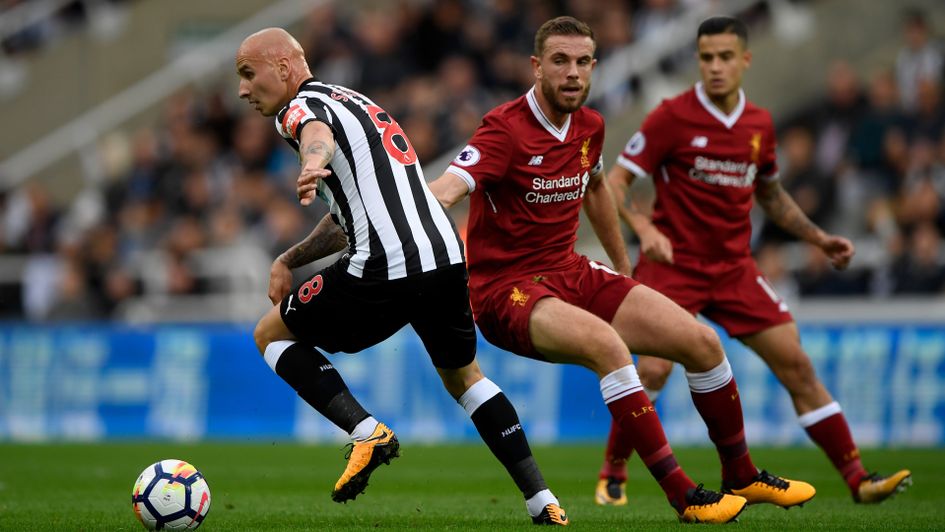 Jonjo Shelvey gets away from Jordan Henderson