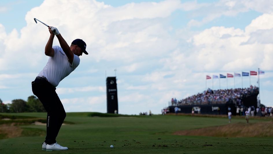 Wyndham Clark tees off at a windy Shinnecock