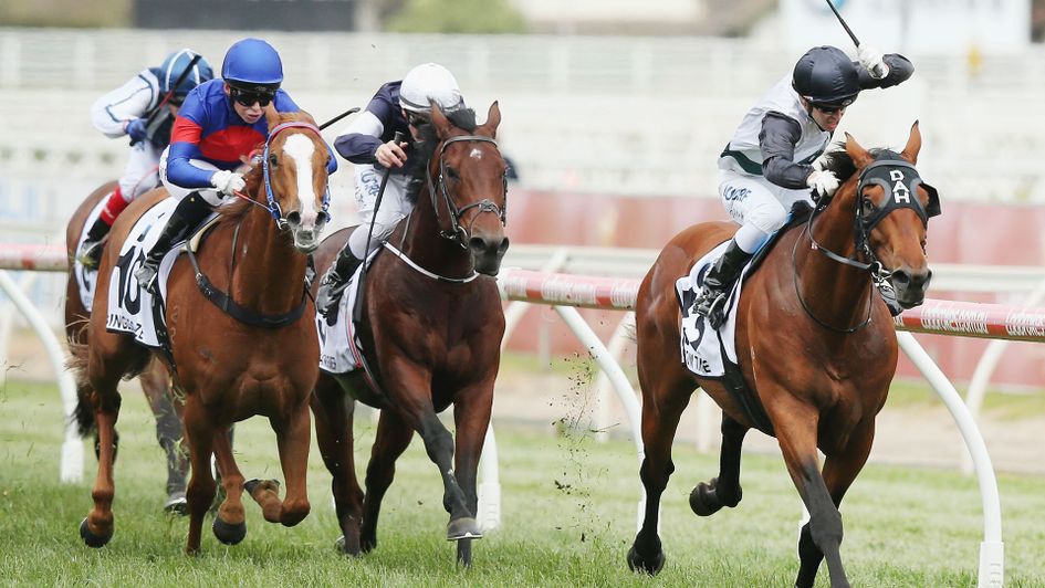 Boom Time (r) ran out a surprise winner of the Caulfield Cup