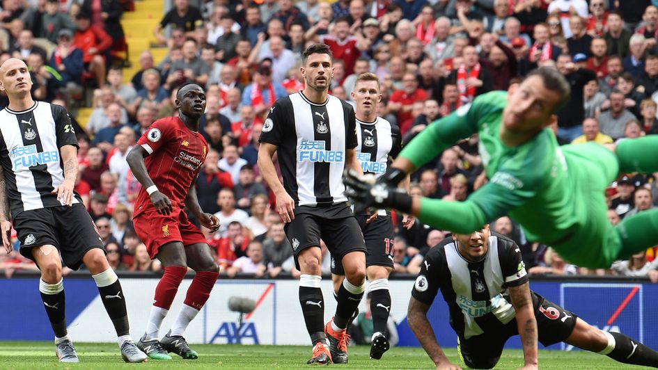 Sadio Mane curls home Liverpool's first goal against Newcastle