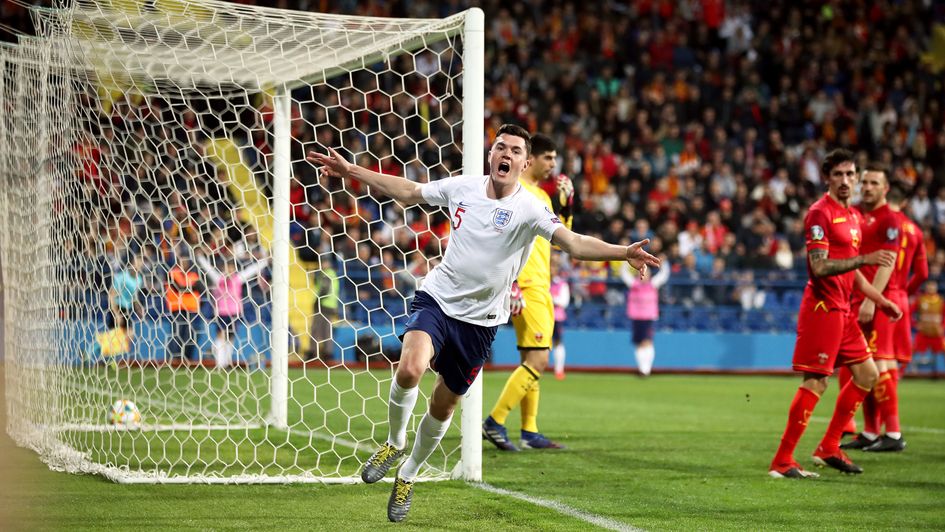 England's Michael Keane (centre) celebrates