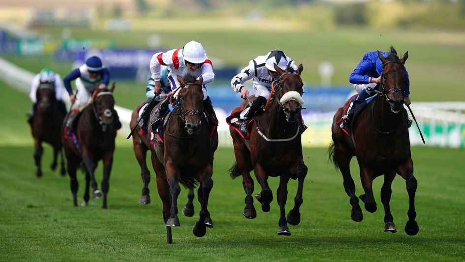 Deauville Legend (white cap) was a narrow winner of the Bahrain Trophy