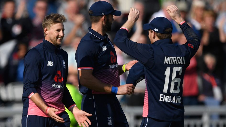 Joe Root, Liam Plunkett and Eoin Morgan celebrate