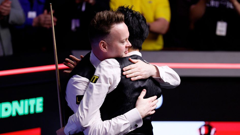 The two players embrace