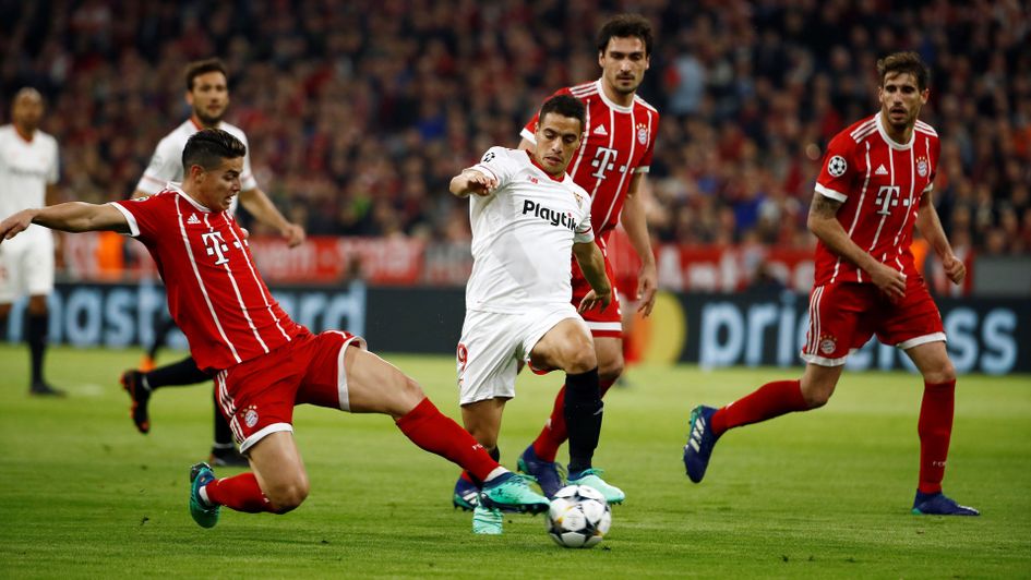 Wissam Ben Yedder is tackled by James Rodriguez