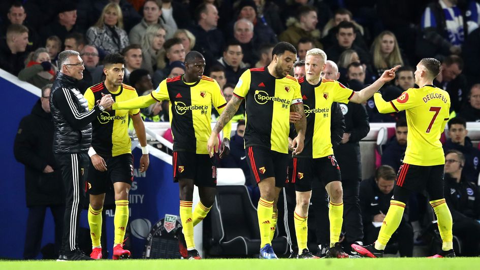 Celebrations for Watford after Abdoulaye Doucoure's goal at Brighton in the Premier League