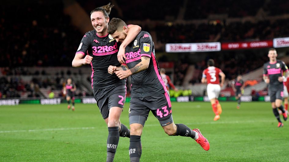 Mateusz Klich celebrates his goal with Luke Ayling