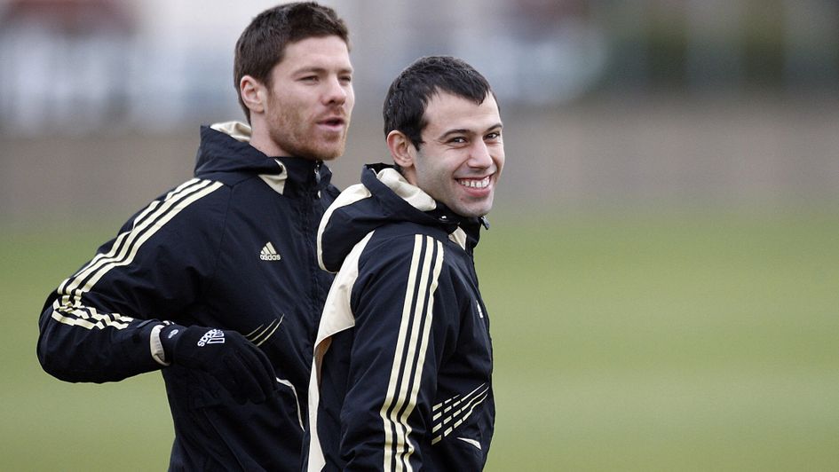 Xabi Alonso (left): The Spaniard made 210 appearances for Liverpool