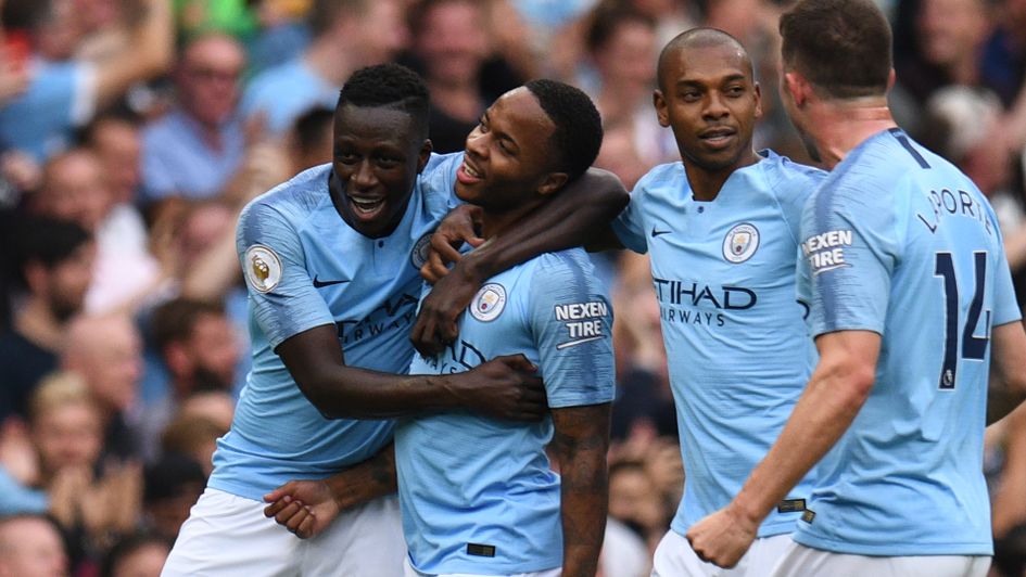 Raheem Sterling is congratulated after scoring