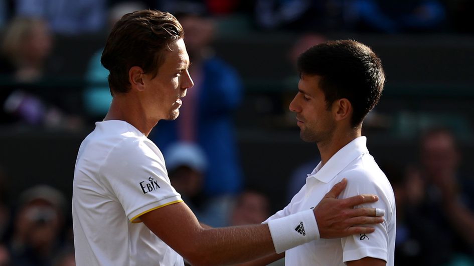 Berdych consoles the injured Djokovic