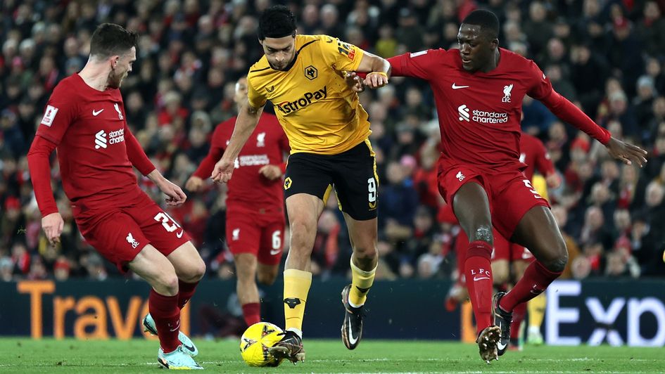 Wolves' Raúl Jiménez attacks the Liverpool defence