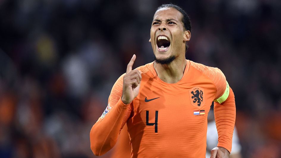 Virgil van Dijk celebrates after scoring for the Netherlands against Germany