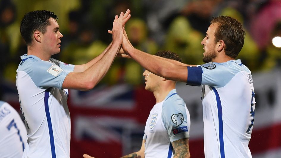 Michael Keane and Harry Kane celebrate