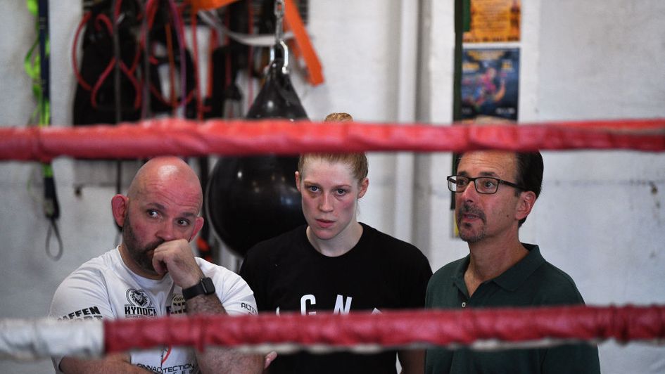 Mark Taffet (right) stands next to Hannah Rankin next to a media workout in New York