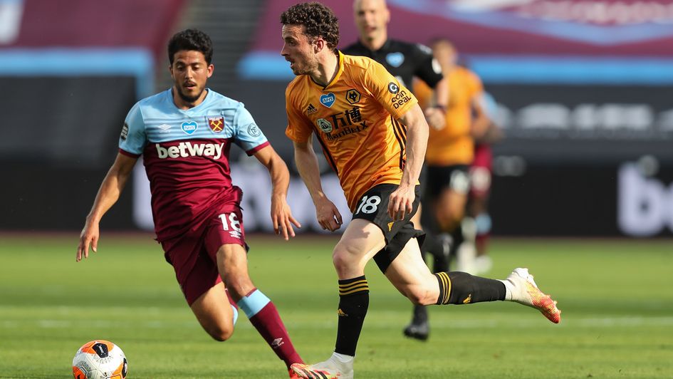 Match action from West Ham v Wolves: Diogo Jota looks to evade Pablo Fornals